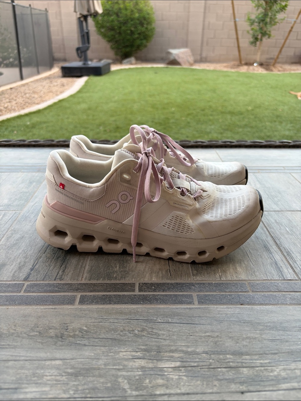 On Running Women's cloud runner Pink and White/cream Athletic Sneakers
